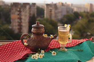 Wellness at home: a cozy evening with chamomile tea.