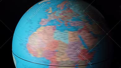 Footage of rotating around blue globe with countries