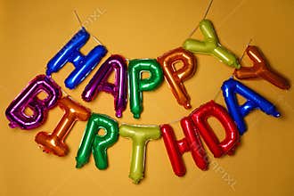 Phrase HAPPY BIRTHDAY made of colorful balloon letters