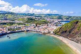 Gates Portao, idyllic beach Praia and azure turquoise Baia do Porto Pim, Horta town, Faial island, Azores, Portugal.
