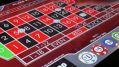 Motion of people betting casino roulette on machine inside Casino