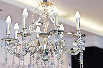 Intricate chandelier in an optician shop.