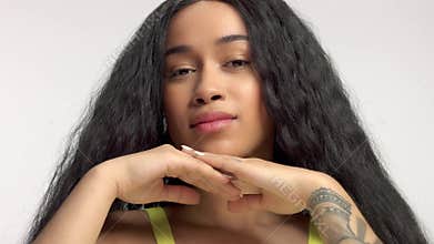 Beauty mixed race african american model in studio portraits with long hair wig