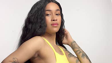 Beauty mixed race african american model in studio portraits with long hair wig