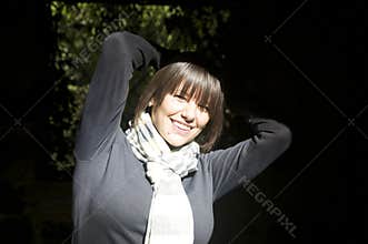 Happy woman in sunlight