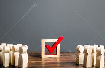 People look at the vot checkmark. Voting in the elections. Democratic institutions process, poll and referendum. .