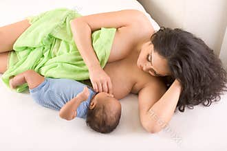 Ethnic Hispanic Mother breastfeeding her son