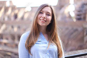 Portrait of smiling young woman.