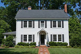 White two-story house built in the 1930s