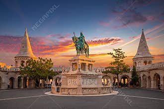 Budapest, Hungary - Amazing golden sunrise over Fisherman`s Bastion at autumn with statue of king St.Stephen