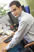 Junior executive working on pc