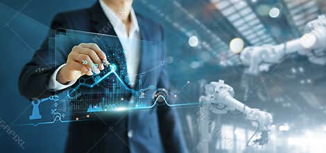 Engineer manager analyzing and control automation robot arms machine on software modern virtual interface data real time  in