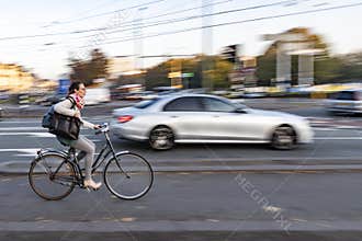 Cyclist rushing out to work in the morning