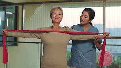 Senior asian woman exercising indoors