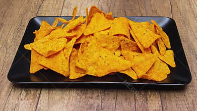 Tortilla chips filling then disappearing from a plate