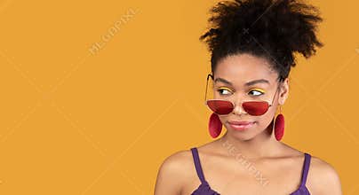 Confident black woman looking away at free space