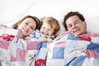 Happy Family in bed