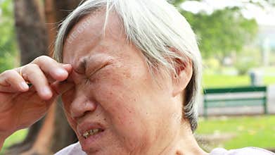 Sad asian senior woman crying and sitting alone,suffer depression problem,anxiety,feel hopeless,disappointed, elderly are crying s