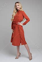 Pretty blonde inlong ink dress and spinning in studio
