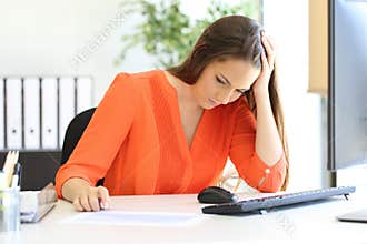 Worried entrepreneur complaining looking at chart