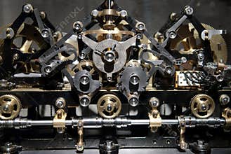 Close up view of old clock gear mechanism