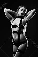 Attractive woman standing in seductive pose