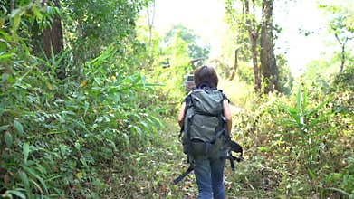 Backpacker run away for animal in the jungle