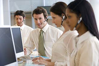 Young man in call center