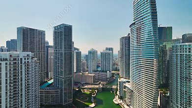Miami Brickell in Florida, USA. View from above of Miami River between concrete and glass skyscraper buildings in city