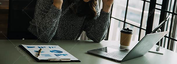 Asian women are stressed while working on laptop, Tired asian businesswoman with headache at office, feeling sick at work, copy