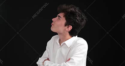 Offended Caucasian man on a black background