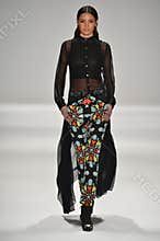 NEW YORK, NY - FEBRUARY 09: A model walks the runway at the Mara Hoffman fashion show F/W 2013 during Mercedes-Benz Fashion Week