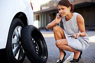 Businesswoman flat tire