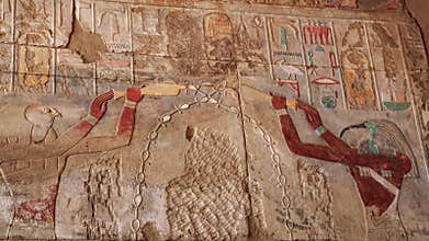 Egyptian hieroglyphs and drawings on the walls and columns. Egyptian language, The life of ancient gods and people in