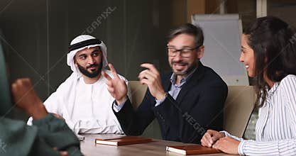 Portuguese boss hold formal negotiations with multicultural business partners