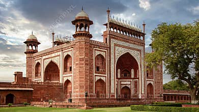Taj Mahal east gate - A beautifully crafted red sandstone structure bearing the heritage of Mughal architecture in India