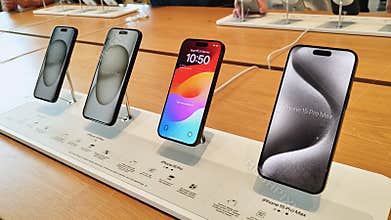 Apple iPhone 15 Pro Max smartphone new models, demo display launch at Apple store. Modern mobile phone technology concept