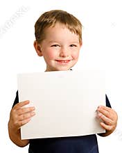 Cute young happy preschooler boy holding up sign