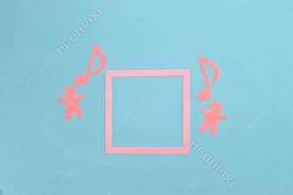 creative music background, paper people and notes flying around pink frame, copy space