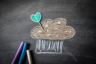 Sweets and birthday concept. Heart and a cake drawn with crayons