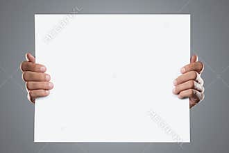 Hands holding blank add