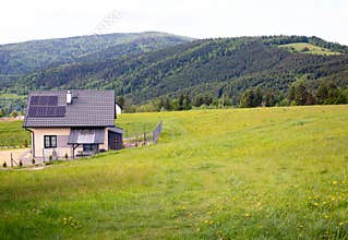Small house, solar panels as renewable source of energy