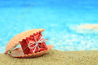 Gift box on the beach