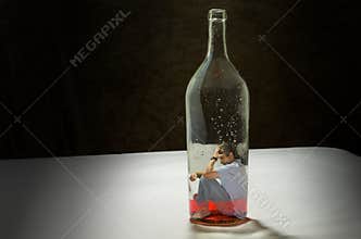 Man addicted to alcohol trapped by alcoholism