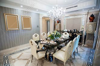 Beautiful dining room with Chandelier in a mansion
