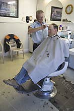 Man getting haircut in Gordon's Barbershop