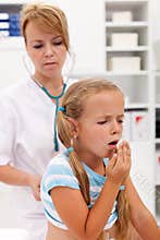 Coughing little girl on health checkup