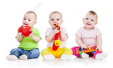 Children babies play musical toys