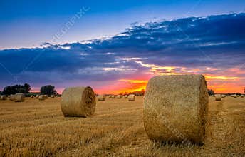 End of day over field with hay bale in Hungary- This photo make