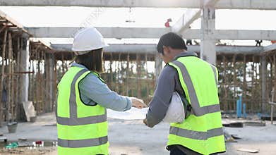 Male and female civil engineers Inspect and analyze projects under construction. Engineering and architectural concepts
